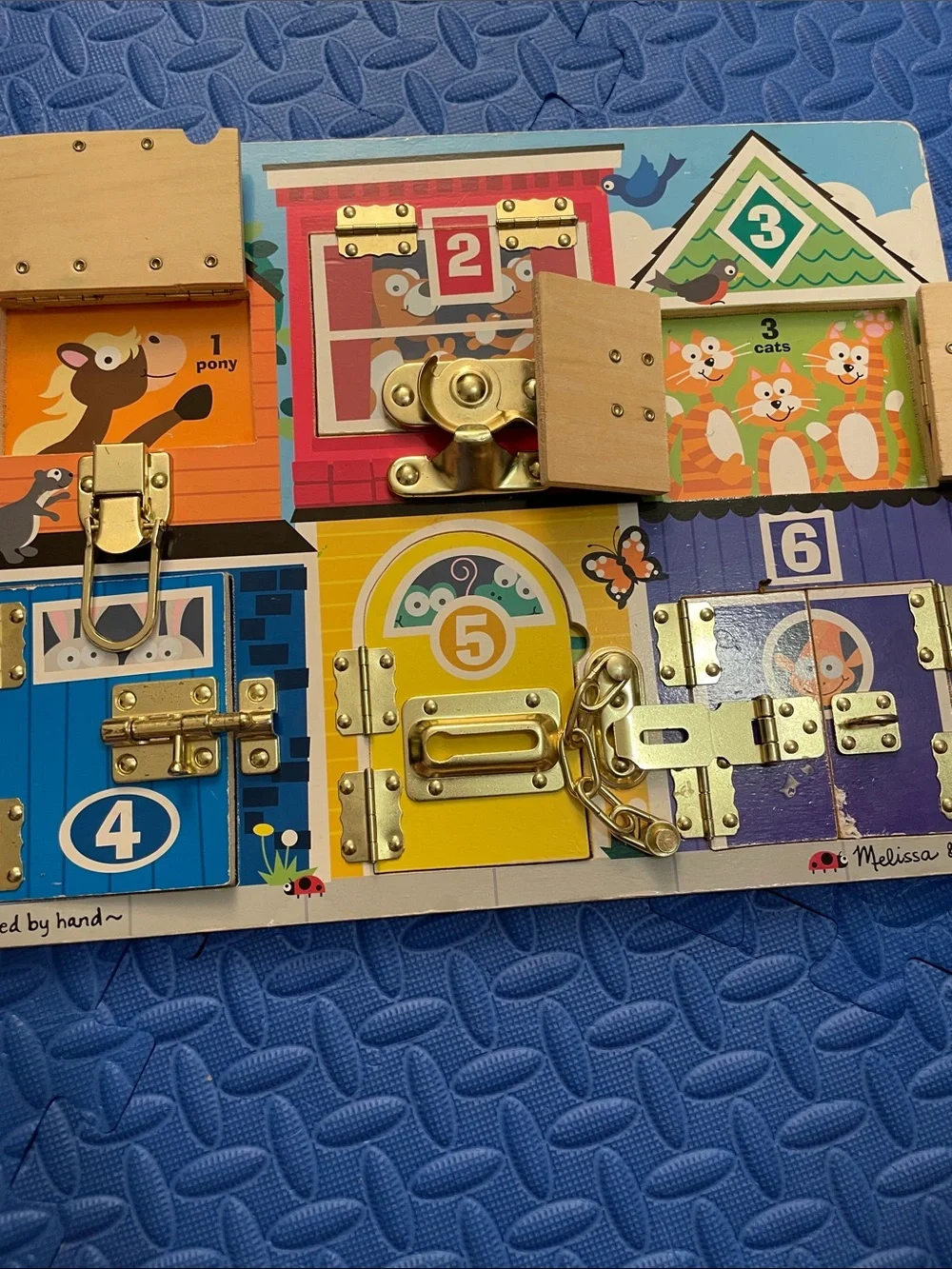 Melissa & Doug Kids' Latch Board Busy Board – Multi Color